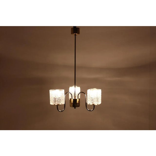 - Very nice style of lighting - 3 flames. This piece is attributed to the mentioned designer/maker. It has no attribution...