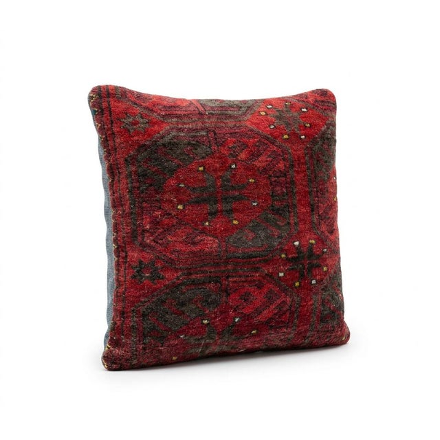 This beautiful 20'' x 20'' pillow cover was made from an authentic Turkish rug. Bright colors of wool adorn the front of...