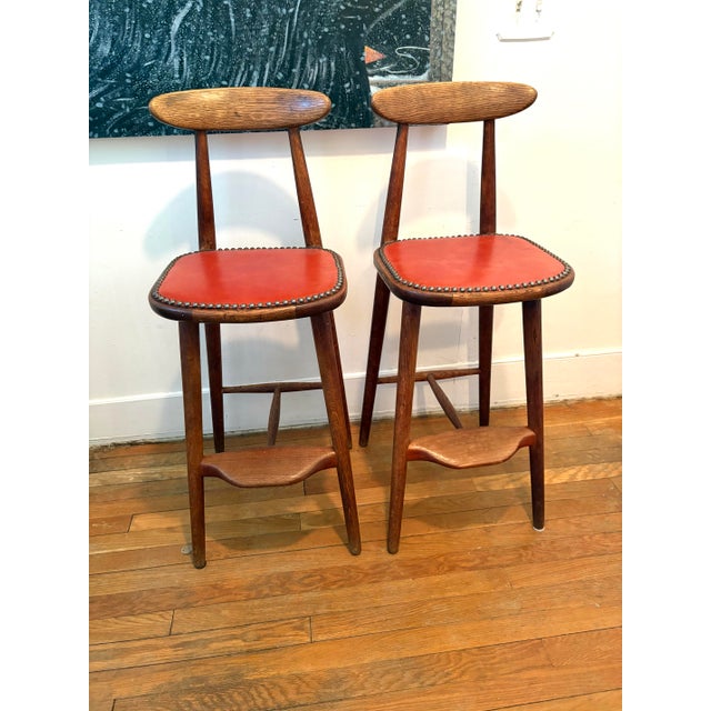 Vintage mid-century Danish bar stool designed by Vilhelm Wohlert for Stolefabriken Odense, featuring a striking red...