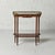 This exquisite 18th-century Louis XVI console table embodies timeless French elegance with its rich mahogany construction,...