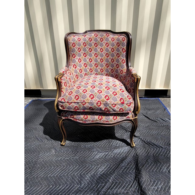 Pair of French Versaille style arm chairs in 100% needlepoint wool fabric. Paisley pattern of red/grey colors. Down filled...