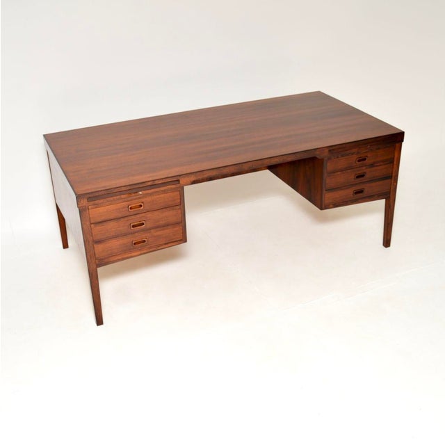 An outstanding and very large Danish vintage executive desk. This was made in Denmark, it dates from the 1960’s. It is a...