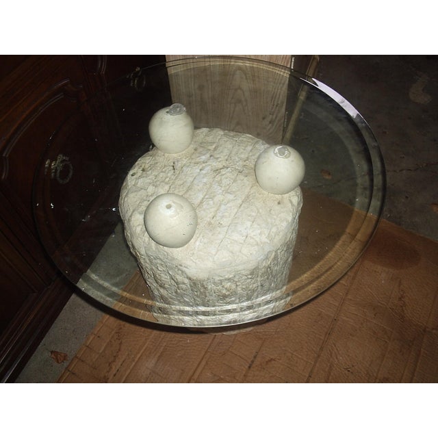 Postmodern tessellated Mactan stone round pedestal base side table with 3 spheres and a round clear beveled glass top, in...