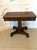 A fine antique Regency Pau Ferro rosewood card table of particularly rich colour and striking grain. The top shows...