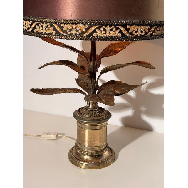 An elegant vintage table lamp attributed to Belgian designer Willy Daro , renowned for his luxurious nature-inspired...