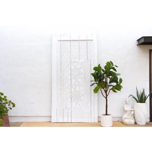 Bring a piece of history and refined artistry to your home with this magnificent antique Moroccan entrance door. This...
