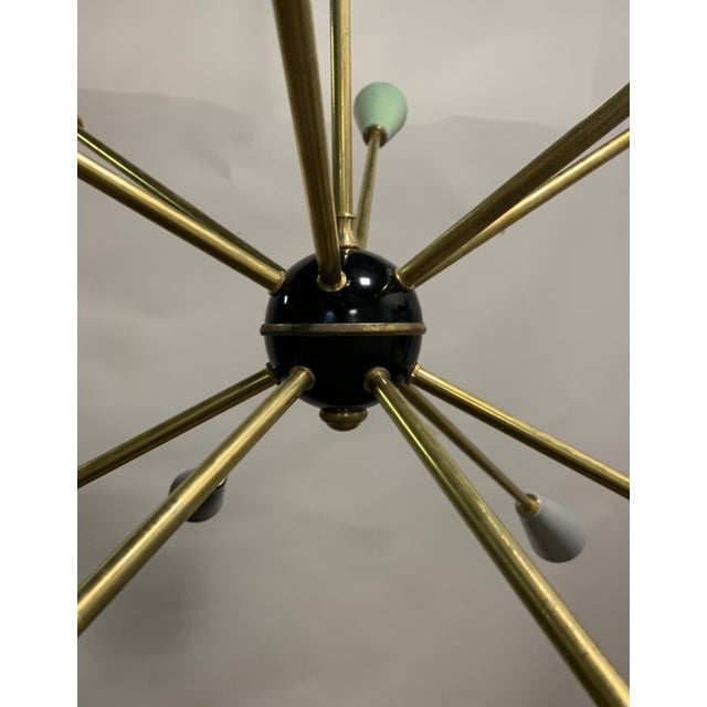 1950s Stilnovo 12-Arm Sputnik Chandelier – Iconic Design with Colored Cones Rare and valuable original Stilnovo Sputnik...