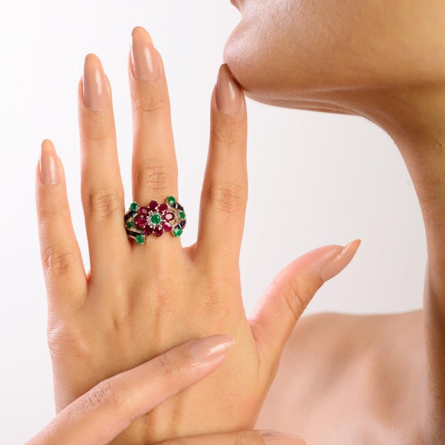 This stunning antique-style cocktail ring is crafted in 925 sterling silver and features a vibrant colorful flower design...