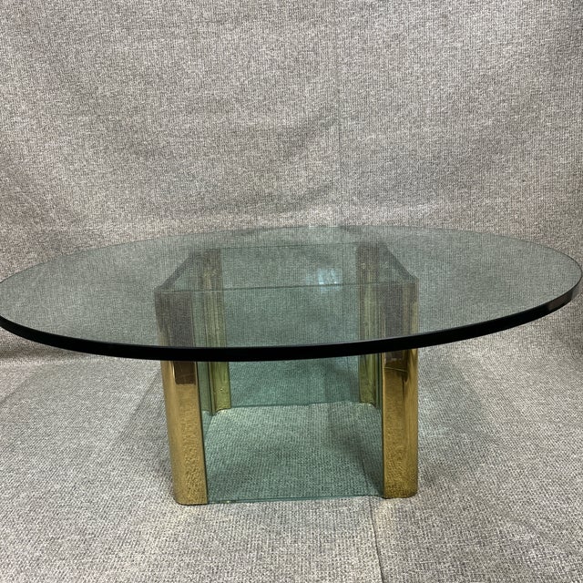 Stunning Glass and Brass Mid-Century Coffee Table, attributed to the Pace Collection. Excellently crafted to exemplify the...