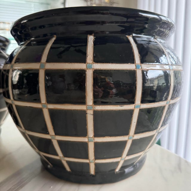 Incredible pair of unique Gridded Vintage Plant pots with unique period grid design. Has turquoise squares as an accent...