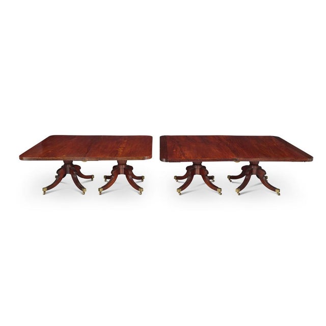 An exceptional and monumental genuine Irish Regency quality mahogany extending dining table of outstanding scale and...