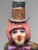 A unique signed and numbered piece by Oskar Raoul, featuring a 24" tall paper mache clown. Raoul is known for his artistry...