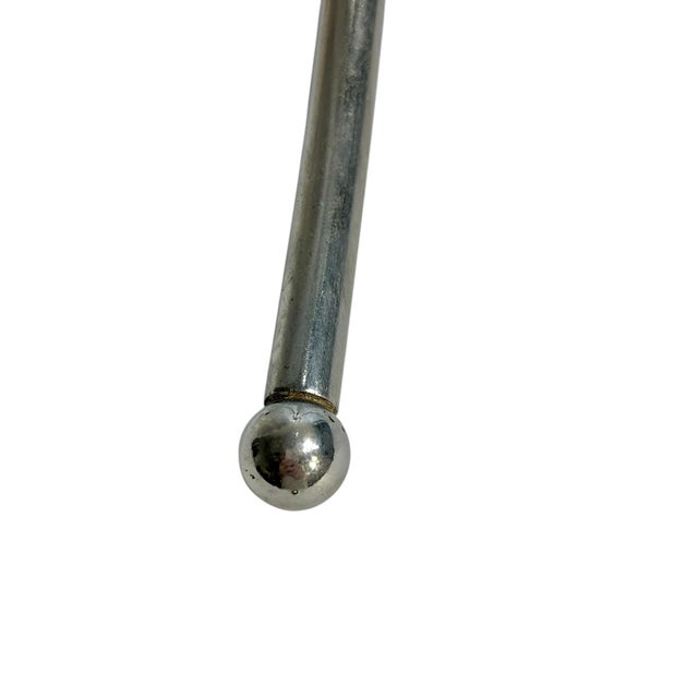 Elevate your entertaining with this striking vintage stainless steel champagne ice bucket on stand. Designed with a sleek,...