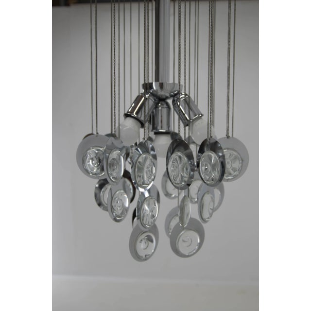 Glass and chrome pendant made in Italy in 1960s. Very good condition, chrome with minimum age patina. 3x40W, E25-E27 bulb...