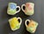 Set your table with these charming floral majolica style pottery mugs and you'll have a touch of spring on your table any...
