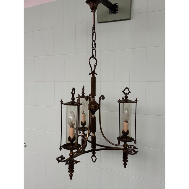 Three-light pendant chandelier. Reflecting the Neoclassical or Empire style, made in the second half of the 20th century....