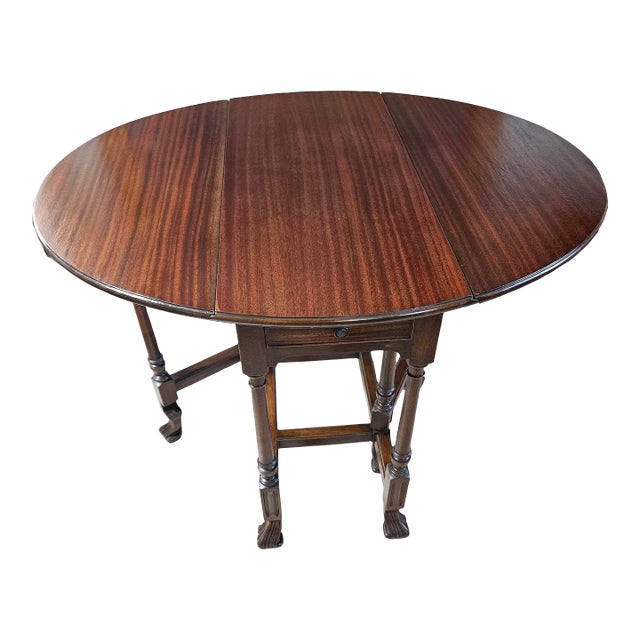Antique Walnut Drop Leaf Gateleg Table Oval Spanish Revival Hoof Feet Carved Legs Circa 1900 For Sale