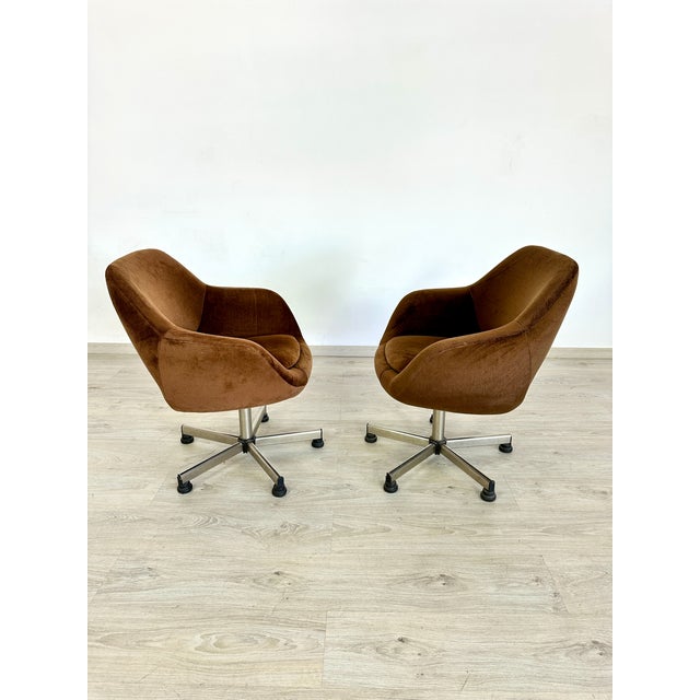 Dimensions: H 30” x W 26” x SD 17.5” x SH 18.3” Pair of Vintage brown velvet egg swivel chairs produced by Stol Kamnik in...