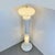 Astounding double-source floor lamp made of white Murano glass with a white lacquered central fixture. Both the bottom and...