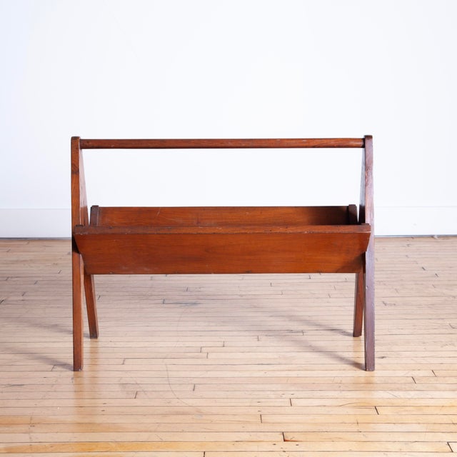 We are pleased to present this elusive portable teak magazine rack designed by Pierre Jeanneret in the late 1950s. This is...