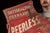 American Antique "Peerless Shoe Repair" Double-Sided Painted Wooden Sign For Sale - Image 3 of 10