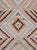This mid-20th-century Turkish Anatolian throw rug presents a geometric composition built from small checkerboard blocks...