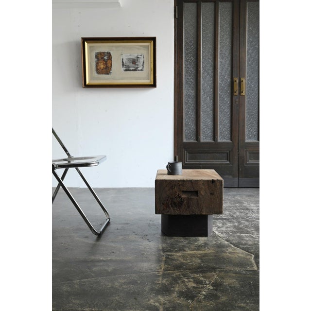 This mini low table is a one-of-a-kind combination piece, assembled from two old Japanese work tables. Its tabletop and...