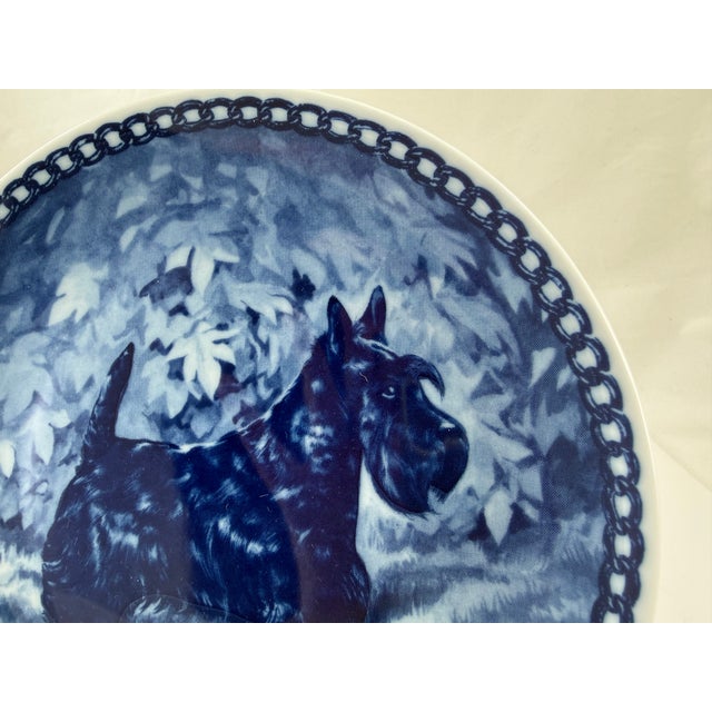Here we have Tove Svendsen blue and white collectible plate crafted in Denmark. The featured dog is the beloved Scottish...