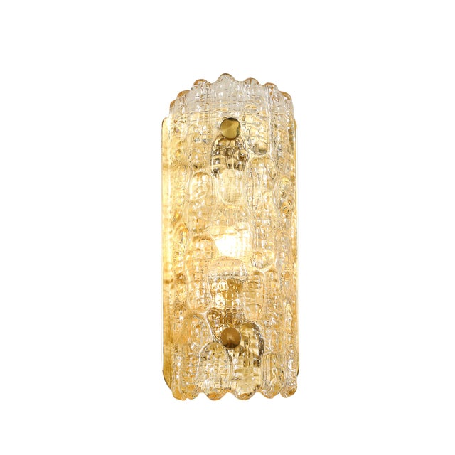 This elegant pair of Mid-Century Modernist sconces, designed by Carl Fagerlund for Orrefors in Sweden circa 1960, is a...