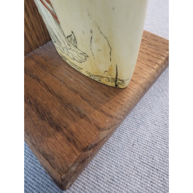 Vintage Scrimshaw bookends, in very good condition. A few at bottom of scrimshaw (please see phoyis). Liberty design and...