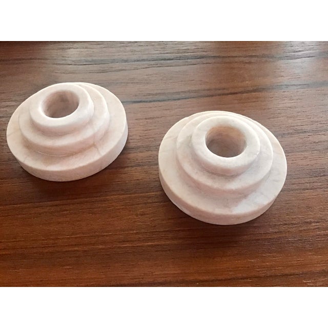 Elegant Art Deco candleholder pair in marble. There is a very shallow chip in the stone on the edge. See photos.