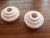 Elegant Art Deco candleholder pair in marble. There is a very shallow chip in the stone on the edge. See photos.