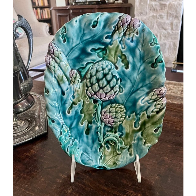 An exceptional antique French Art Nouveau majolica asparagus and artichoke serving platter, expertly crafted circa 1890 by...
