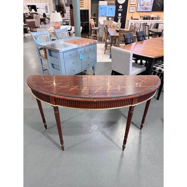 An exceptional John Widdicomb Collection demi-lune console table by Stickley, inspired by the timeless elegance of...