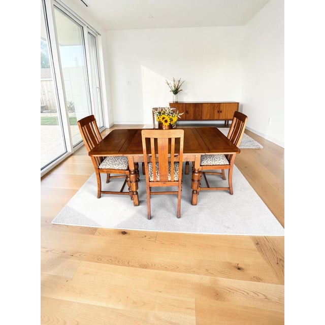 1930 Pristine Quarter Sawn Tiger Oak Draw-Leaf Table. Completely refinished and restored to its original elegance. This...