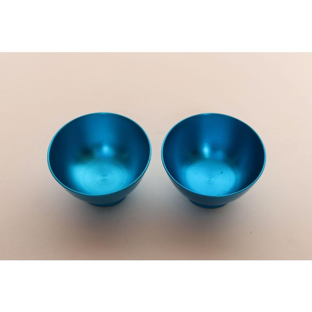 Pair of Mid-Century Modern sherbets or small bowls in turquoise anodized aluminum (ca. 1960s USA). Very good, vintage...