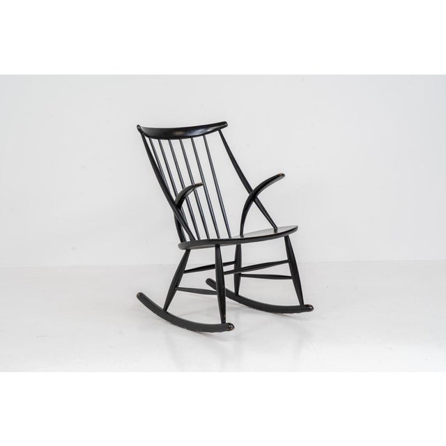 “IW3” rocking chair by Illum Wikkelsø for Niels Eilersen (Denmark, 1950s). A contemporary piece with nice organic lines....