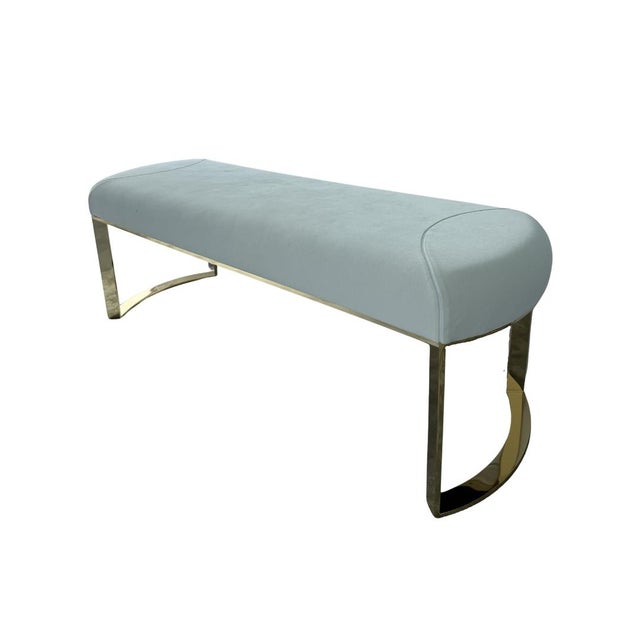 Luxurious Bench with White Ap lomb C 032 Upholstery and Polished Brass Base This elegant bench is fully upholstered in the...