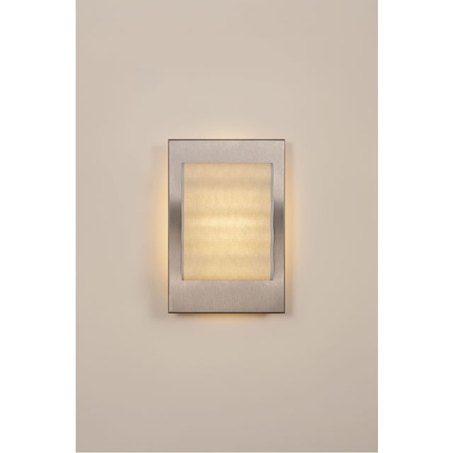 Introducting Frame, a collection of handcrafted wall sconces. Featuring a minimalist design, simple forms, and the subtle...