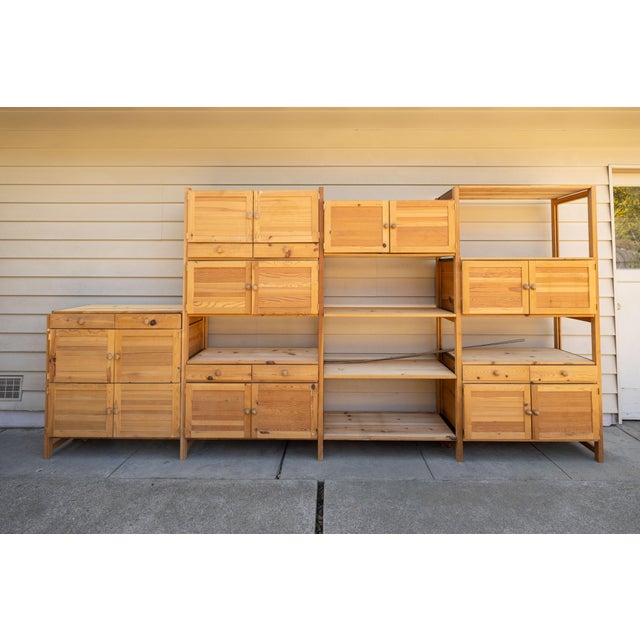 A large Lundia modular shelving unit made from solid pine, designed in Sweden in 1939 by Harald Lundqvist. This piece...