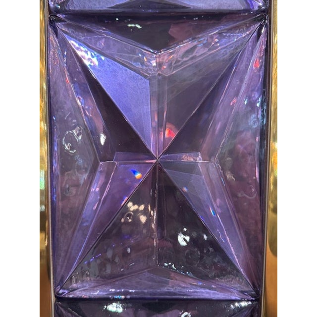 The Modern Lavender Murano Glass and Brass Mirror is a very stylish accessory. The vibrant color of lavender along with...