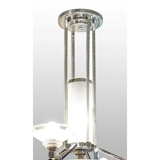 Material: brass chrome -plated, glass bowls etched river acids, 4 lamp shells rest on a large shell and give the luster a...