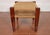 Stylish vintage Danish style woven paper cord and teak wood foot stool. It is in very good vintage condition overall with...