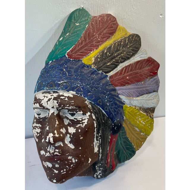 Vintage chalk ware Native American wall mounted bust with headress.
