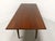 A custom crafted American Farmhouse style dining table by D.R. Dimes. Solid cherry wood, top is banded at each end & has a...