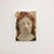 Figure IV by Yushi Dangami | Oil on canvas painting of a figure with red hair and a neutral expression. For Sale