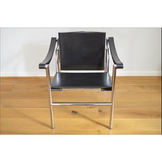 A piece of design history: the lc1 by le corbusier, designed in 1928. A simple armchair in the minimalist style of the...
