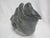 Pitseolak Koperqualuk in Salluit, Nunavik, Quebec, Canada, inuit stone carving of a man and a seal. Etched signature,...