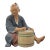 Japanese Hakata Urasaki Ceramic Doll Figurine Seated Elder Man Playing Drum For Sale