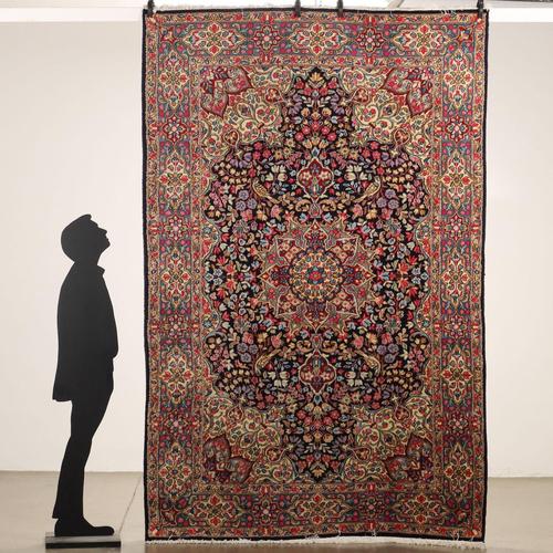 Kerman rug in cotton and wool, large knot, hand made. This piece is attributed to the mentioned designer/maker. It has no...